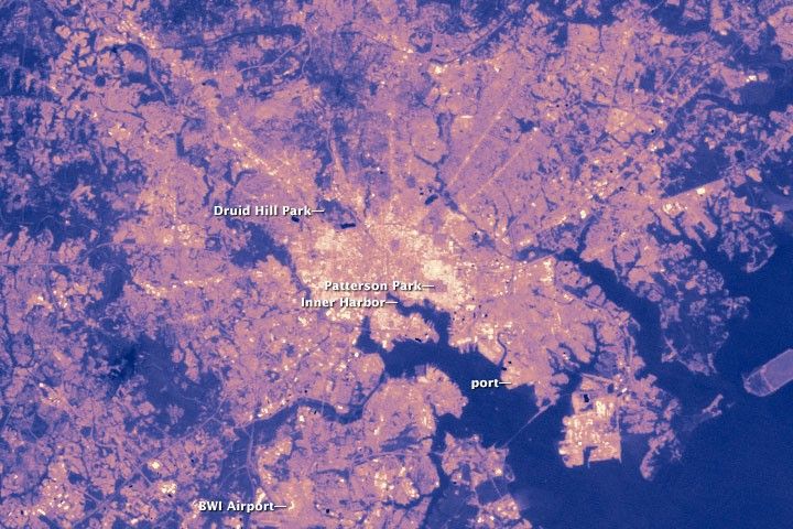 NASA Landsat thermal map of Baltimore showing land surface temperature — dense urban areas are up to 10 degrees Celsius hotter than surrounding forests